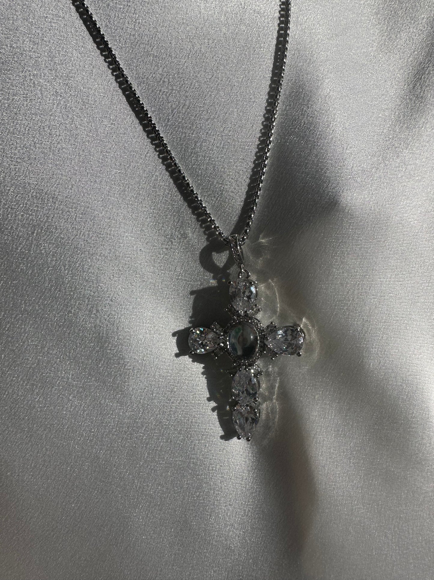 Saturno cross in silver