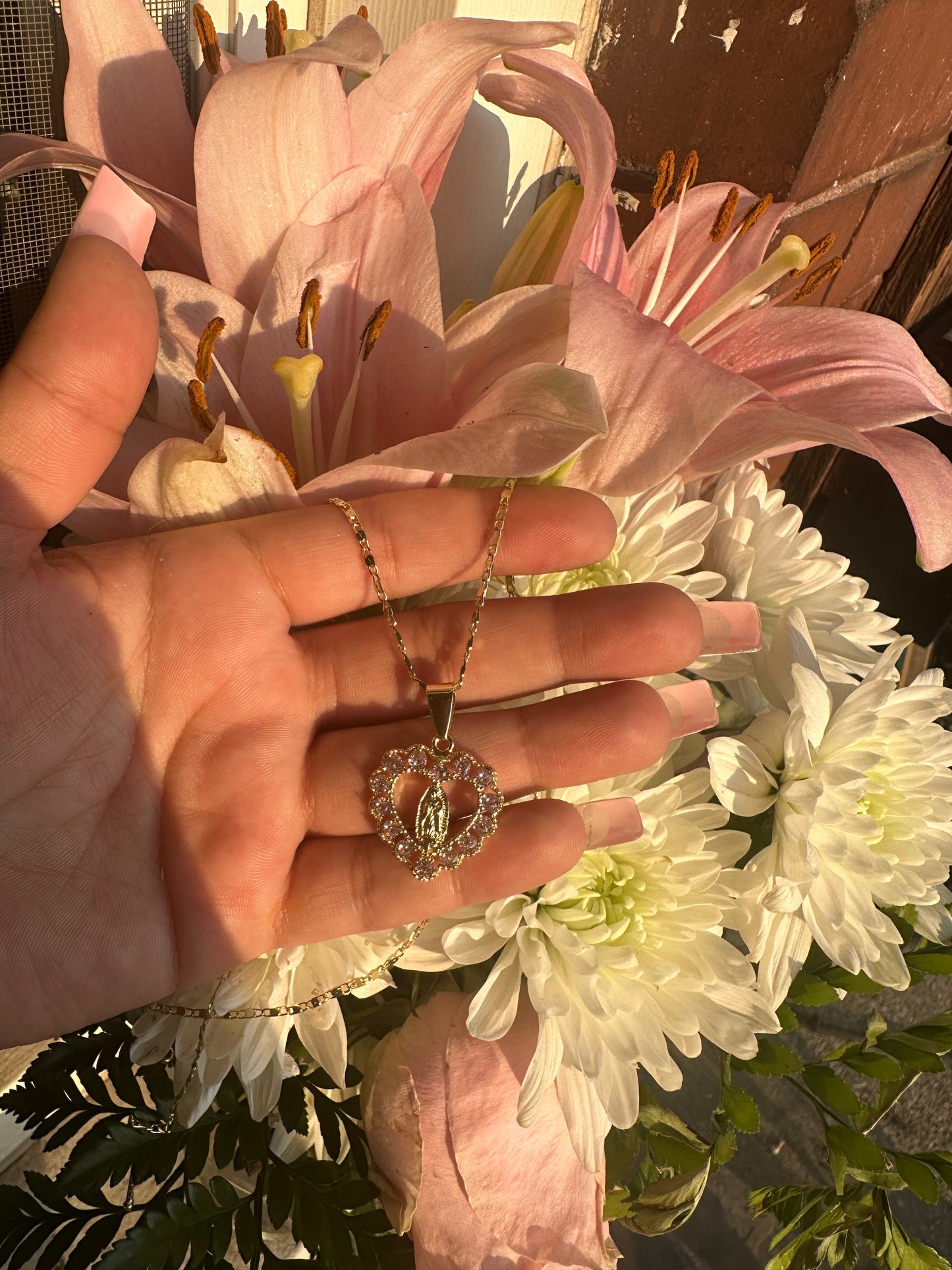 Pink heart with virgin de Guadalupe