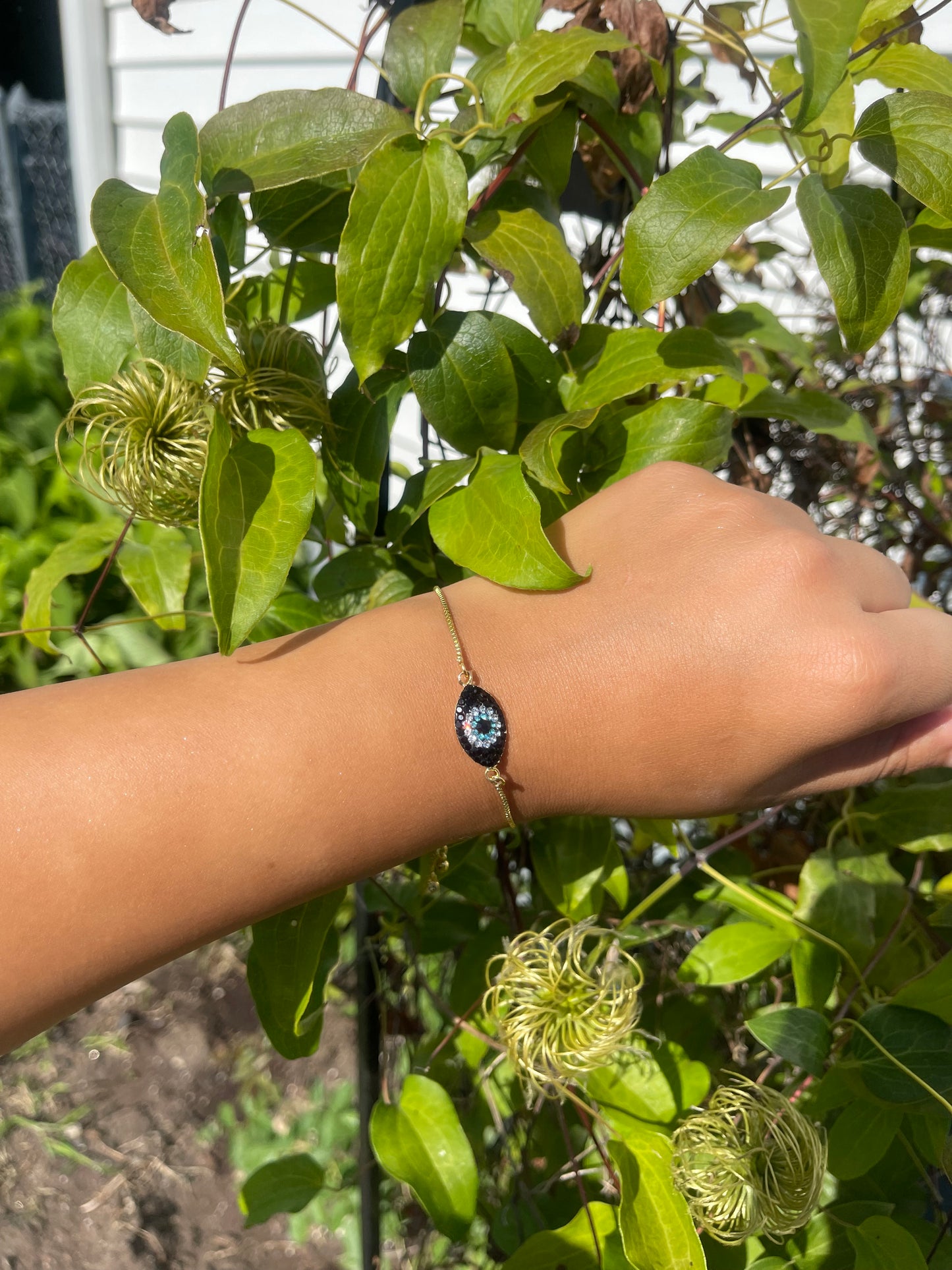 Black evil eye string gold bracelet
