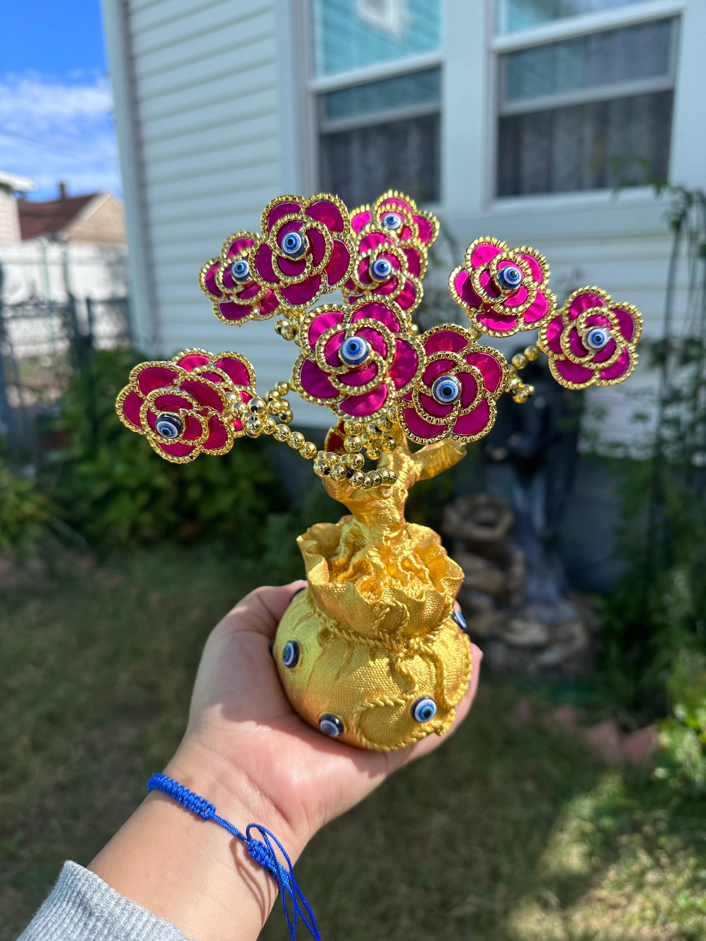 Pink flower evil eye tree