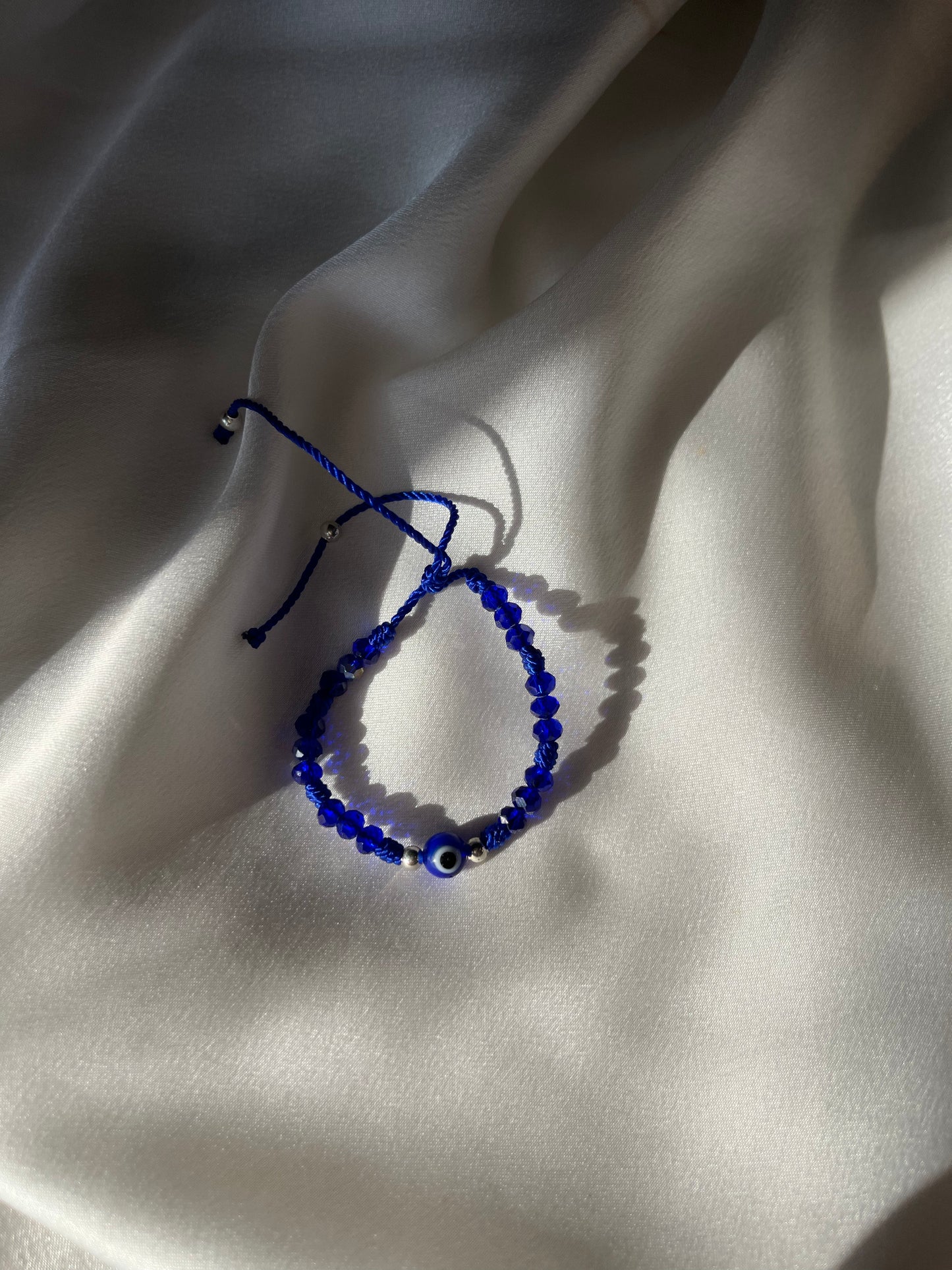 All blue baby evil eye