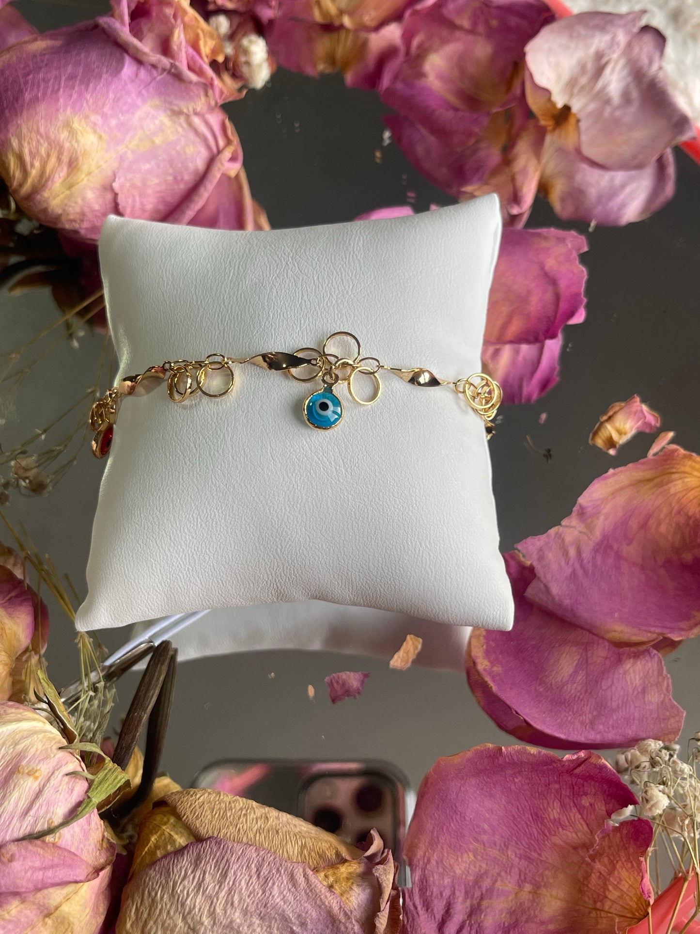 Red, yellow, green,and blue evil eye bracelet gold